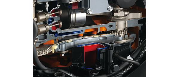SELF-ADJUSTING TIMING CHAIN